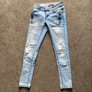 Light wash skinny with zippers